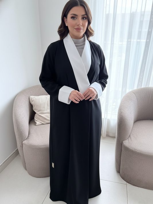 عباءة "الأبيض والأسود"