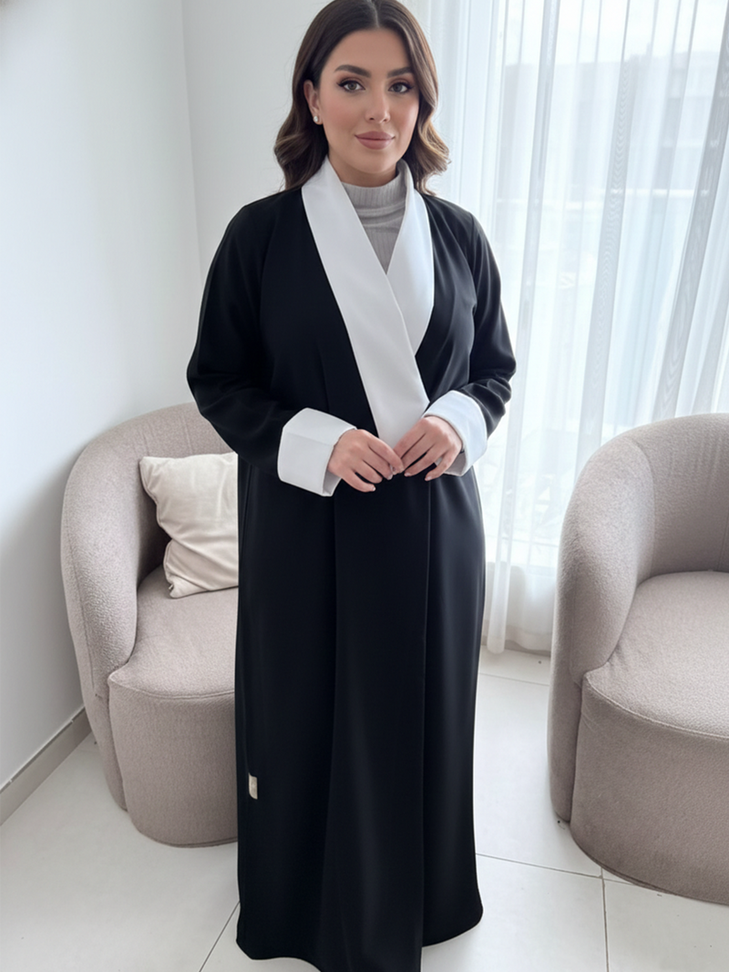 عباءة "الأبيض والأسود"